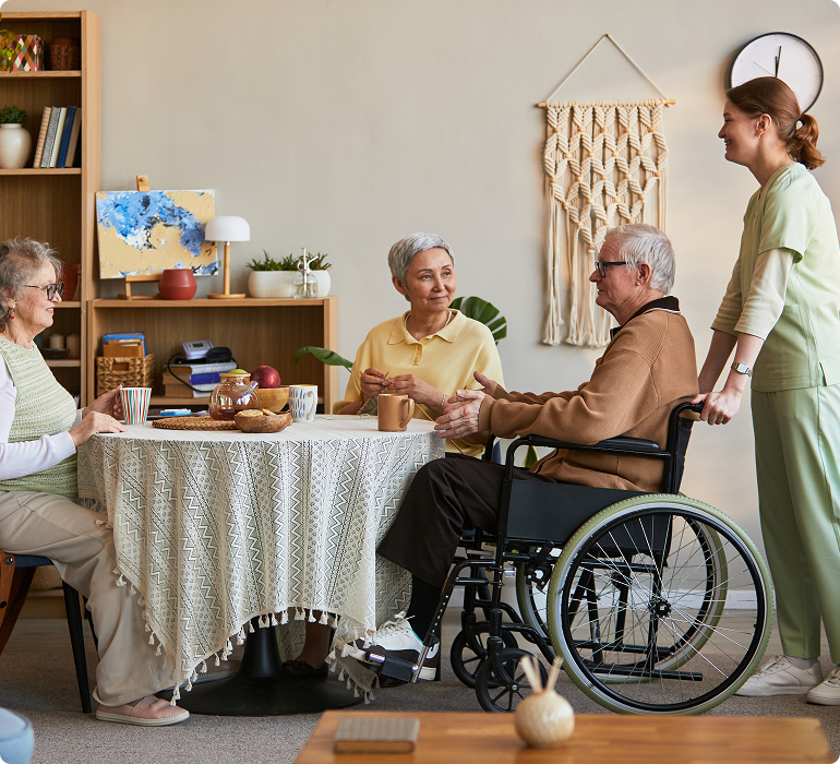 Team members share a supportive moment together in a welcoming community space.